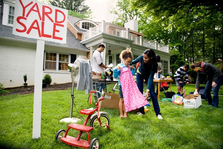 Wide view of suburban yard sale